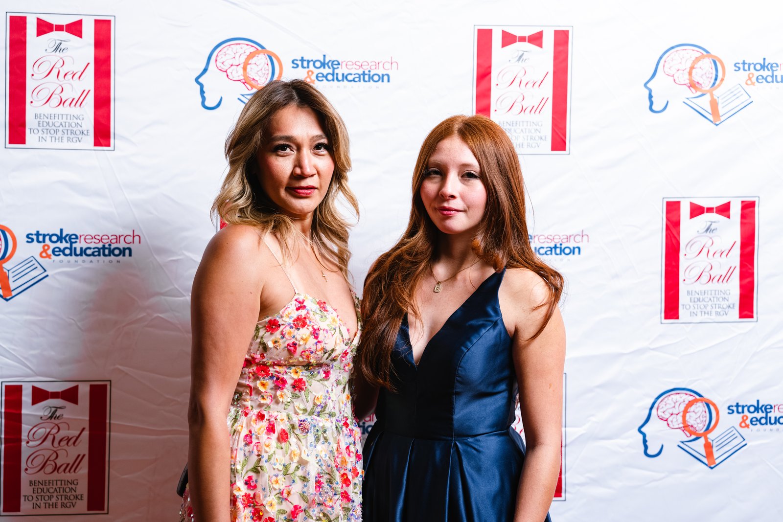7th Annual Red Ball — guests at the step & repeat